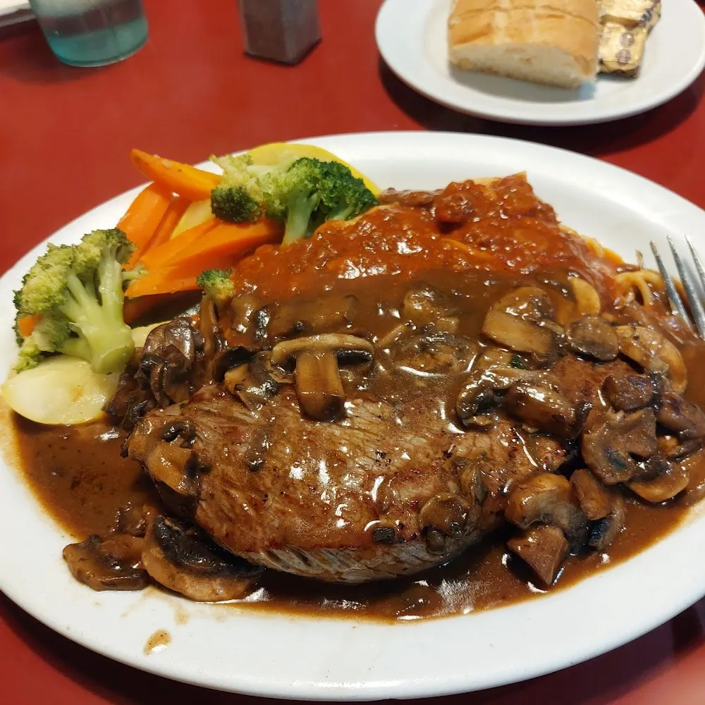 Colette Steak with Sauteed Mushrooms and Spaghetti Bolognese